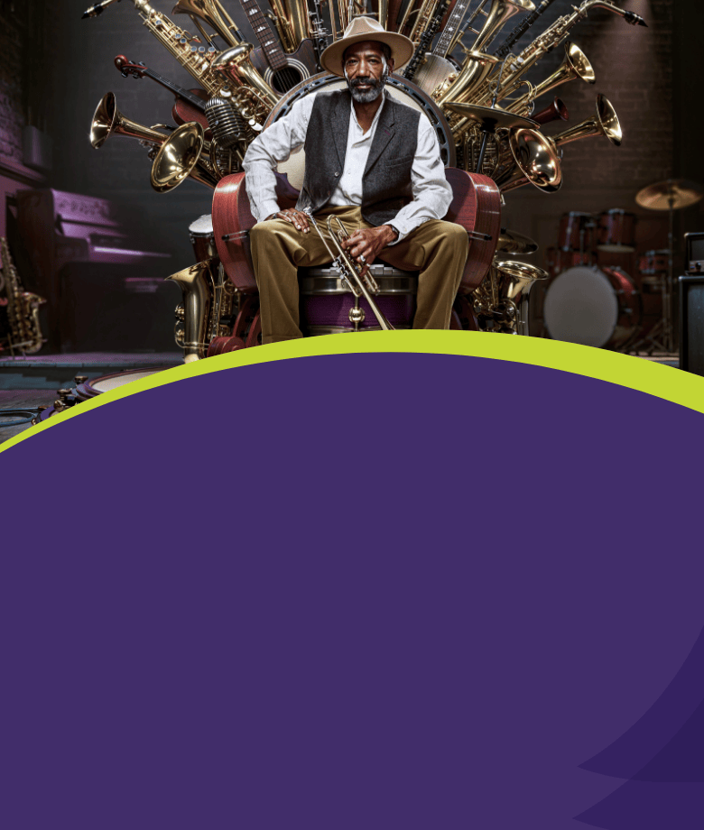 Sitting confidently on a throne of musical instruments, an elderly man holds a trumpet.